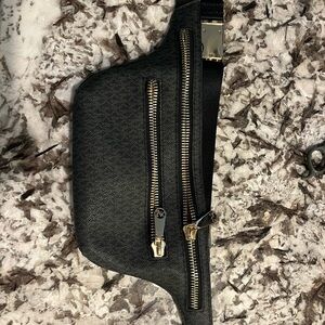 Michael Kors Black and Gold Belt Bag with Structured Design